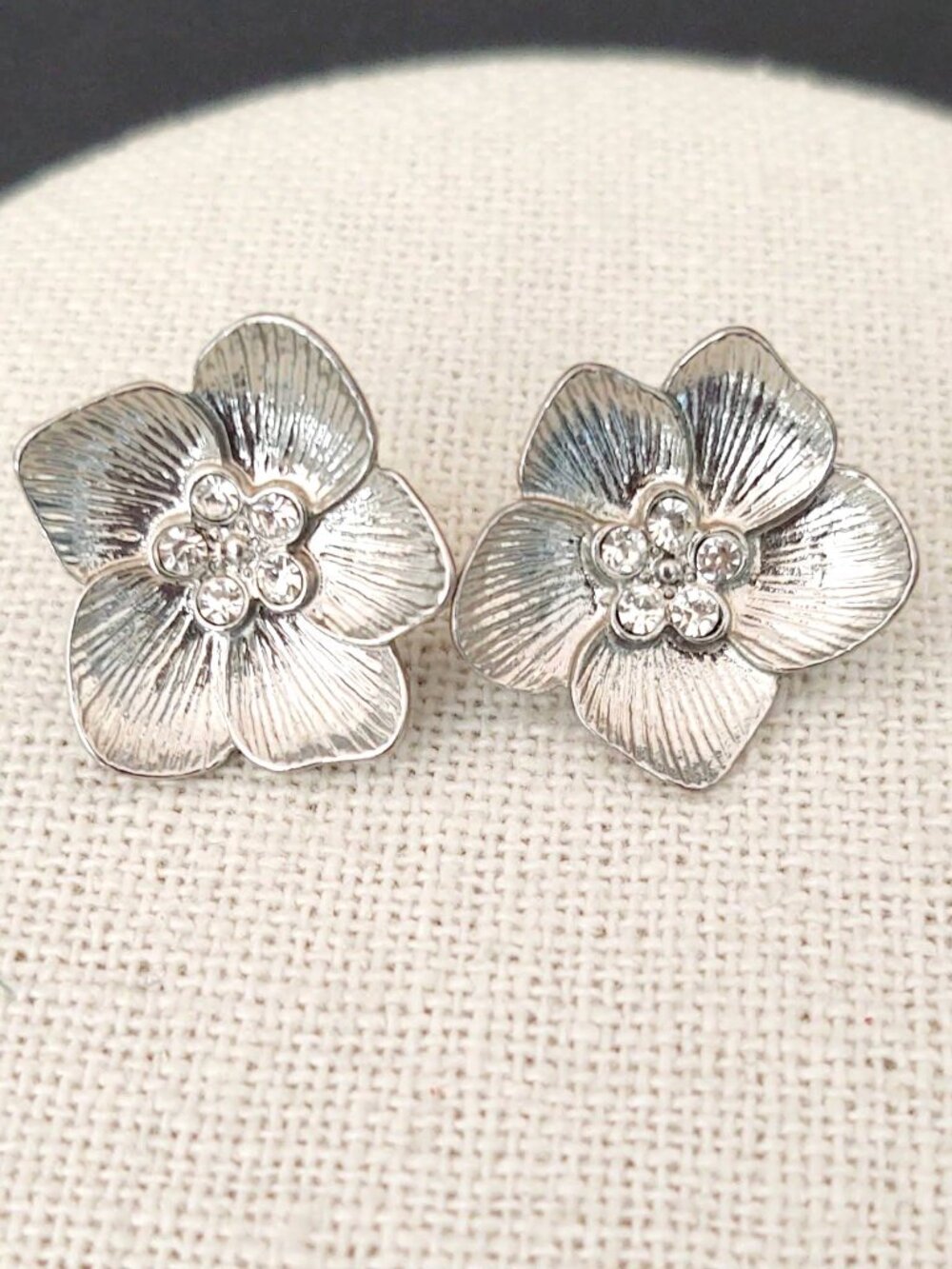 Textured silver flower earrings with cz centers